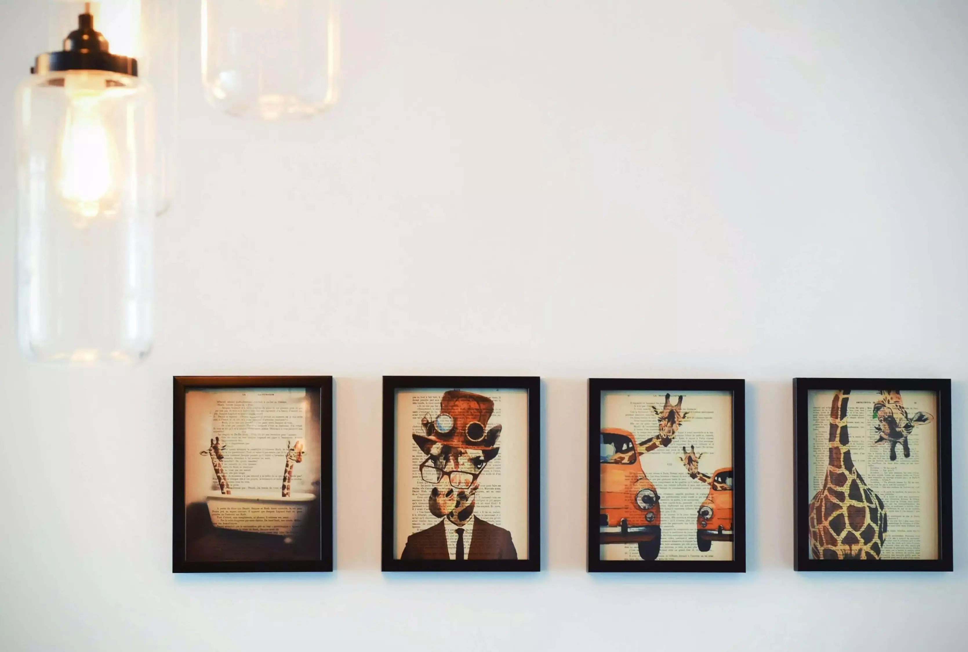 Several Paintings Hanged on a Wall in a Row